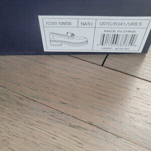 White leather loafers with chain details